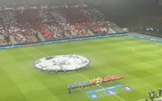 hino assistir jogo champions league